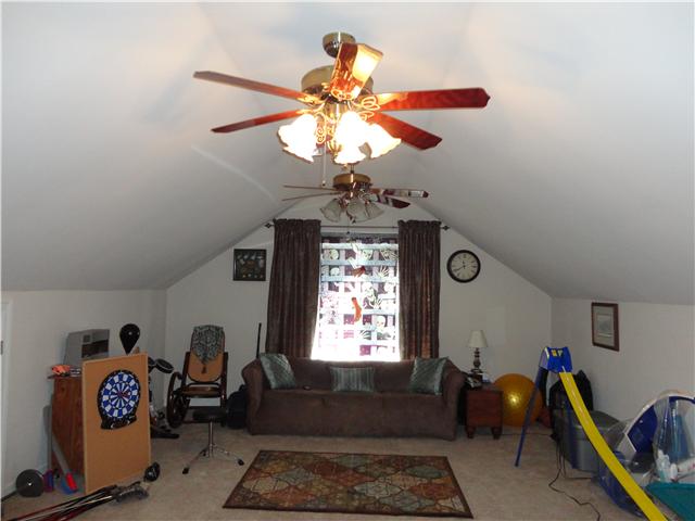 6153 Lakeview Road Springfield, TN 37172 - Photo 15 of 16 Large bonus room with vaulted ceiling, two ceiling fans and half bath.