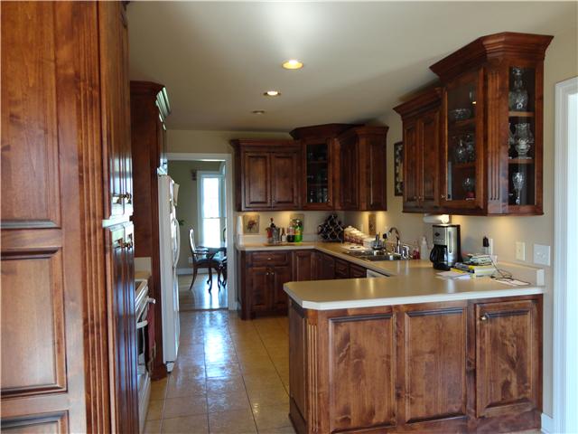6153 Lakeview Road Springfield, TN 37172 - Photo 5 of 16 A kitchen you can't believe with loads of custom alderwood cabinetry. Note the display cabinet with glass doors!