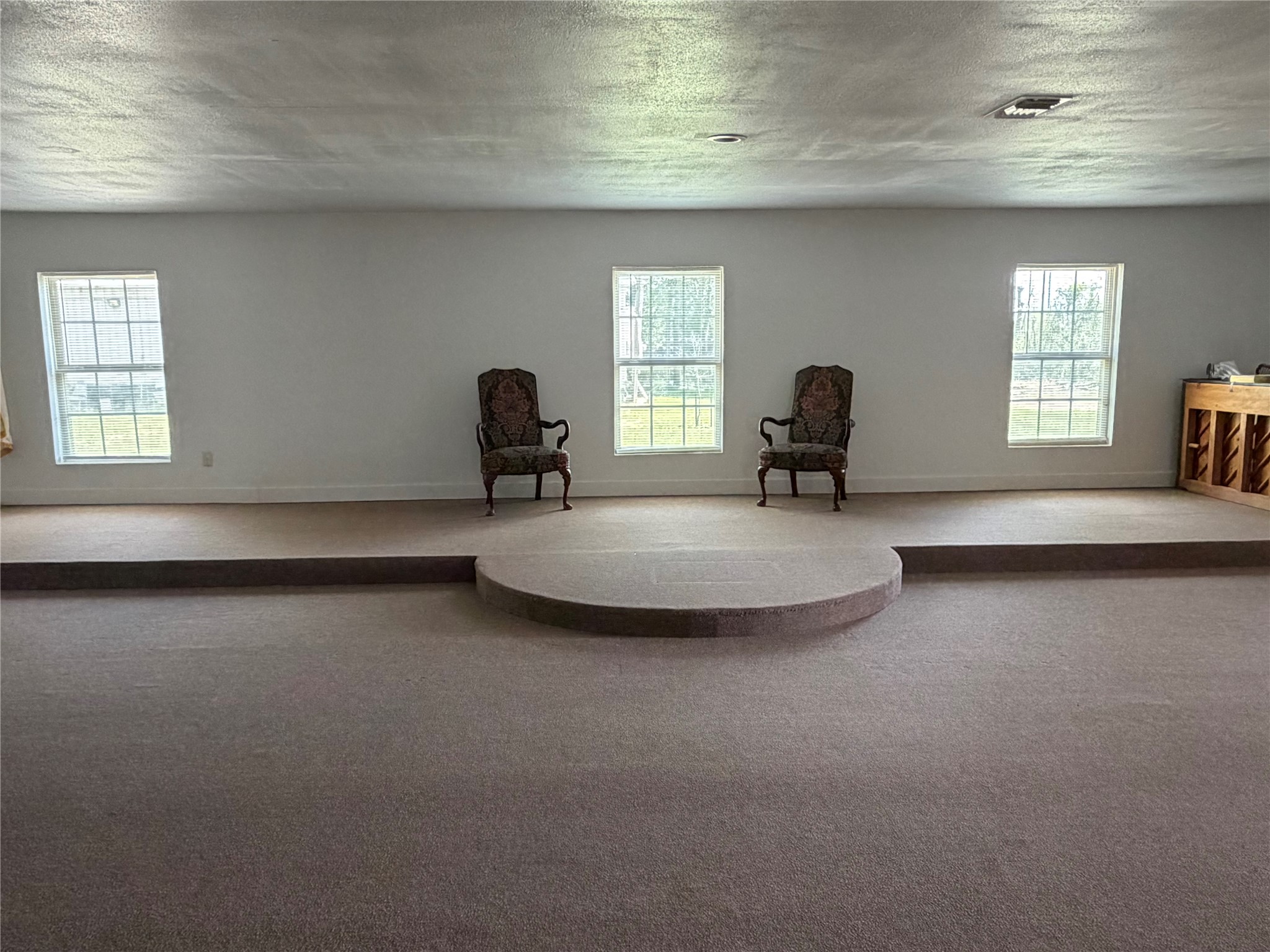26630 Betka Road Hockley, TX 77447 - Photo 8 of 11 a view of a livingroom with a chair and a fireplace
