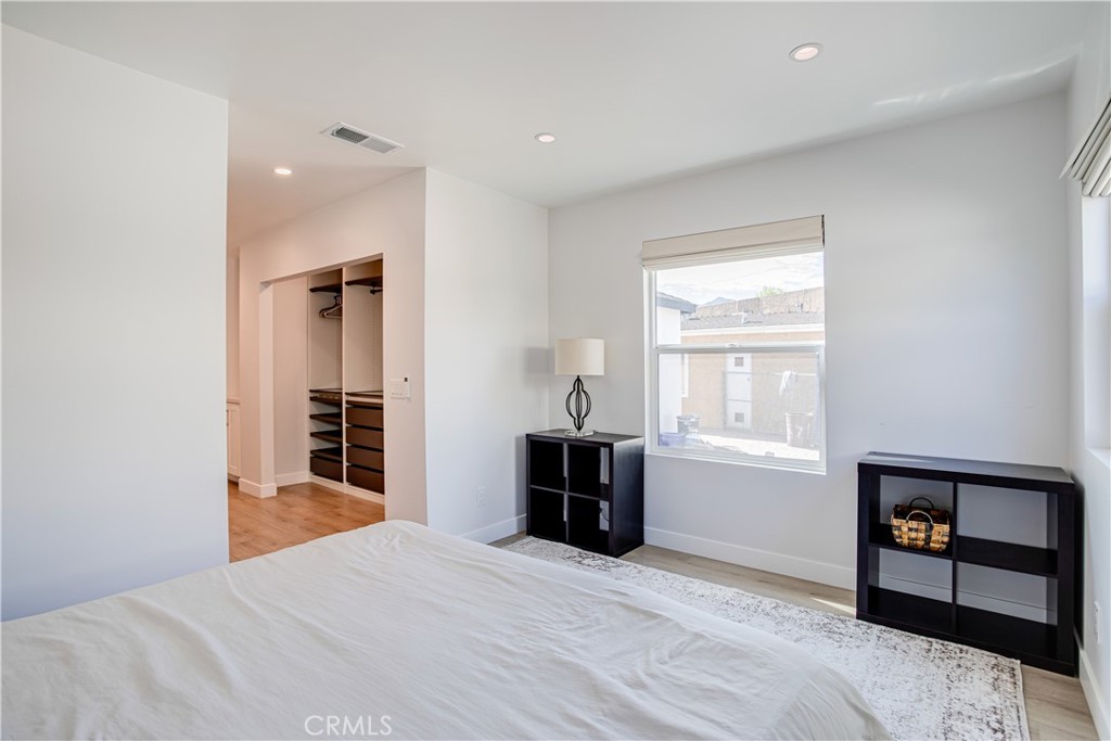 517 Davis Avenue Glendale, CA 91201 - Photo 12 of 18 a bedroom with a bed and a window