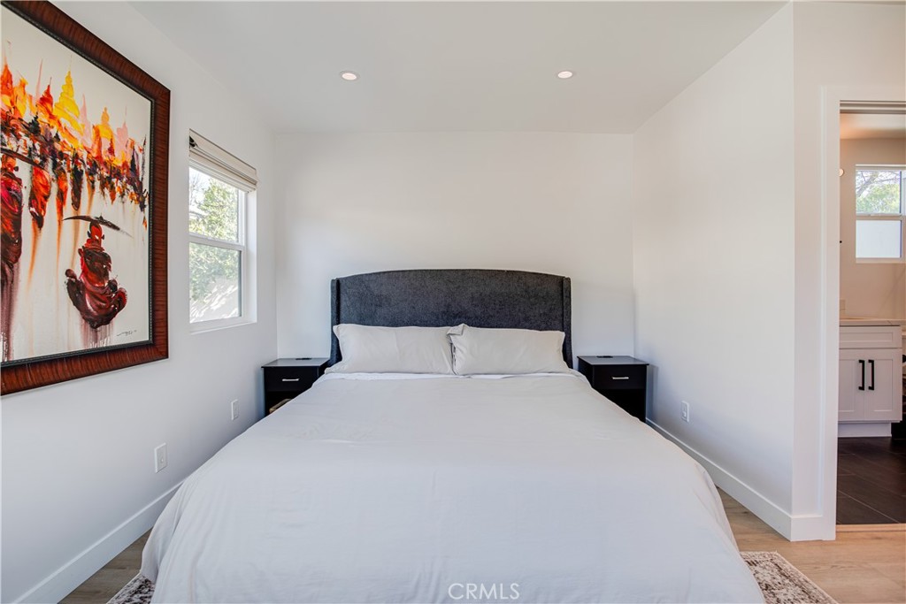 517 Davis Avenue Glendale, CA 91201 - Photo 13 of 18 a bedroom with a large bed and a window