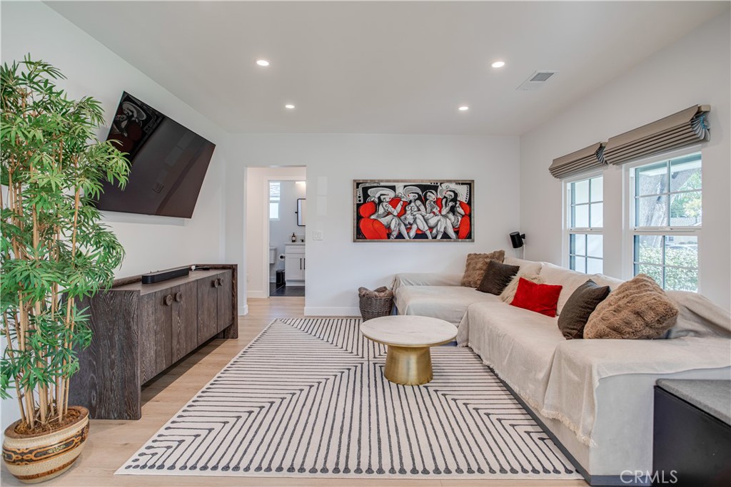 517 Davis Avenue Glendale, CA 91201 - Photo 2 of 18 a living room with furniture and a flat screen tv
