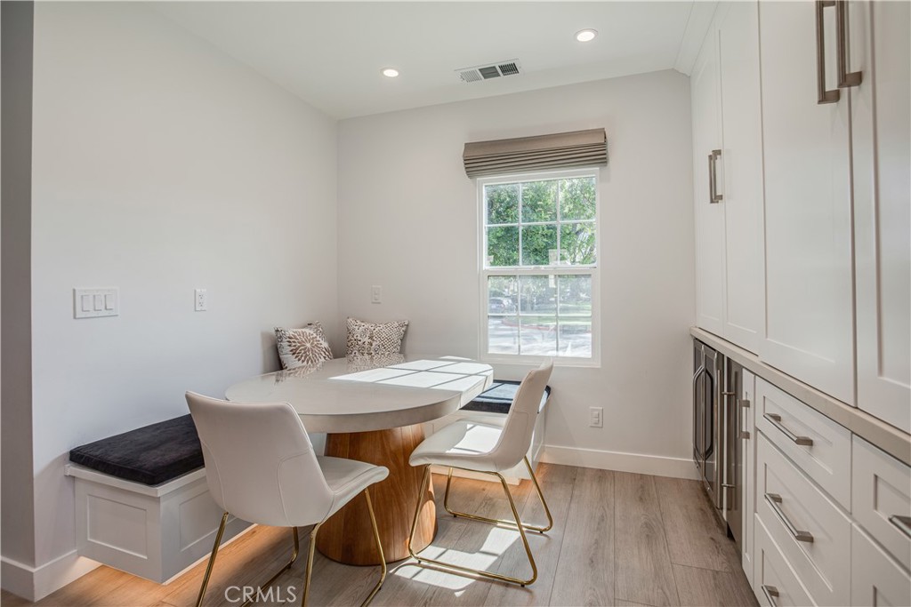 517 Davis Avenue Glendale, CA 91201 - Photo 7 of 18 a view of a dining room with furniture and wooden floor
