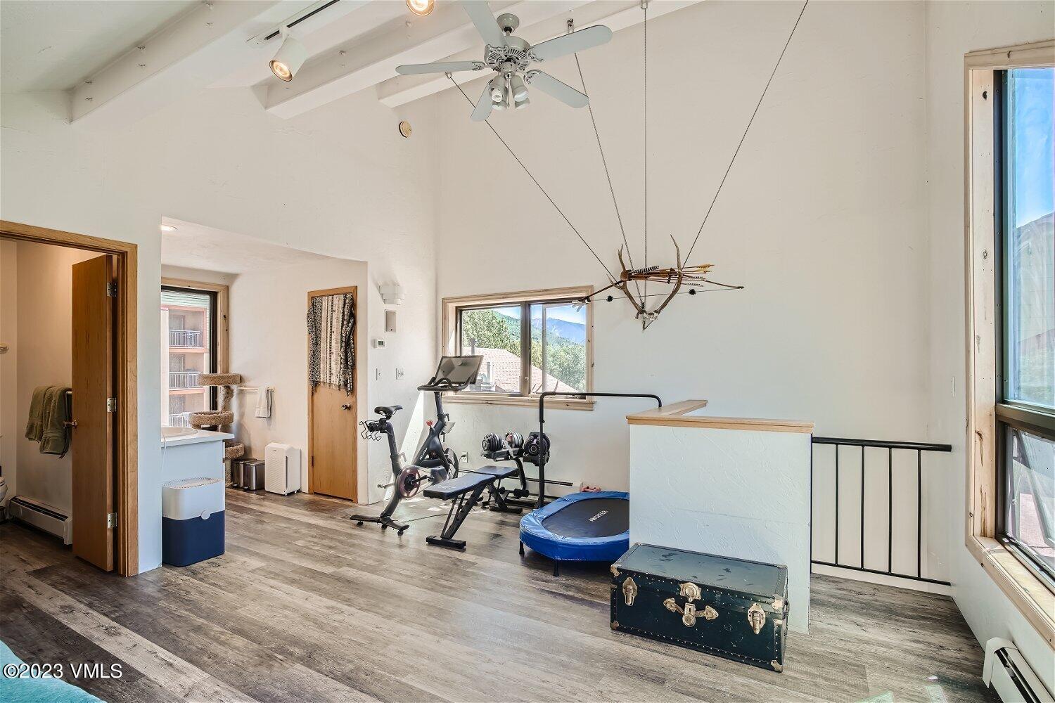 963 Lions Ridge Loop, Unit 503 Vail, CO 81657 - Photo 20 of 28 a view of a room with gym equipment