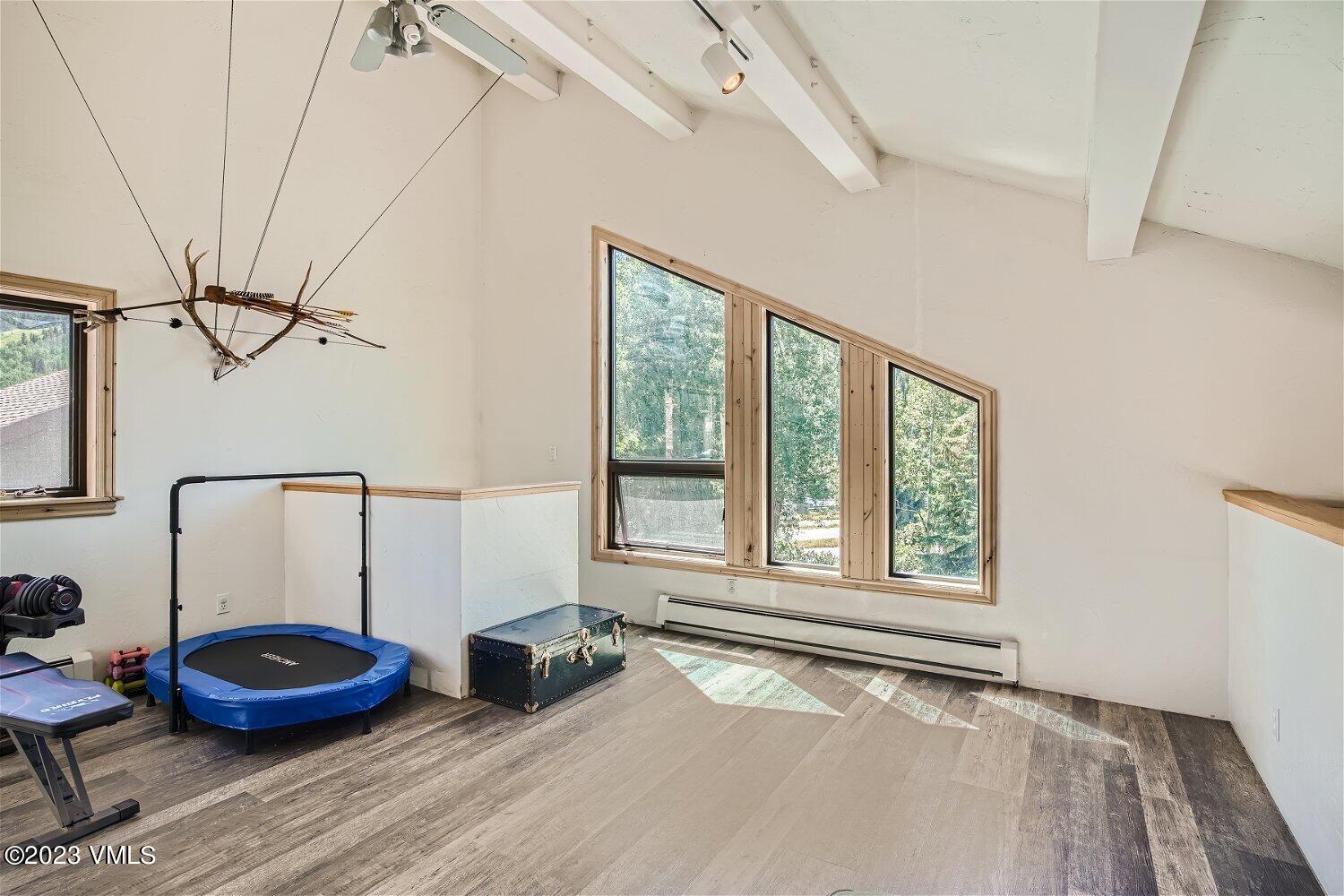 963 Lions Ridge Loop, Unit 503 Vail, CO 81657 - Photo 21 of 28 a living room with furniture and a window
