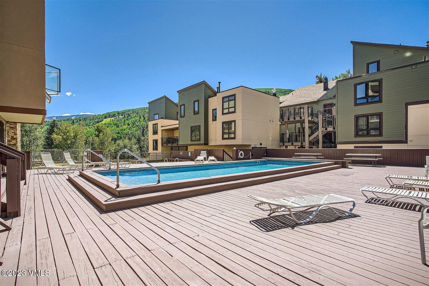 963 Lions Ridge Loop, Unit 503 Vail, CO 81657 - Photo 27 of 28 a view of a roof with sitting area