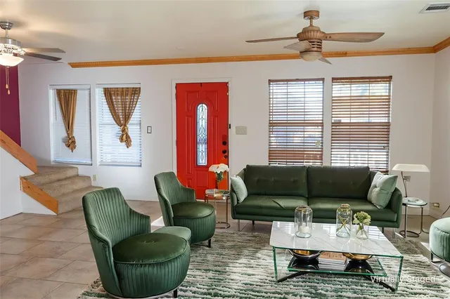 a living room with furniture and a window