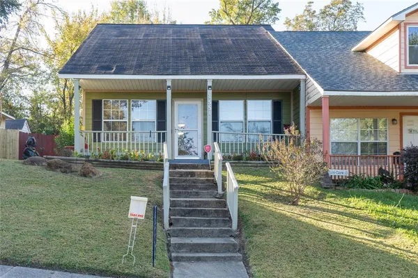 a view of a workspace with furniture