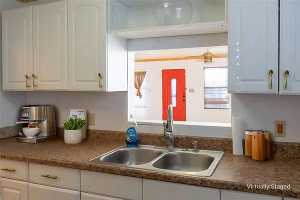 a view of entryway and livingroom