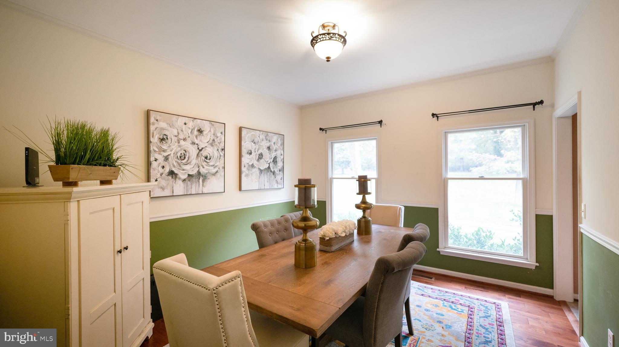 2826 Gracefield Road Silver Spring, MD 20904 - Photo 14 of 40 a living room with furniture and a window