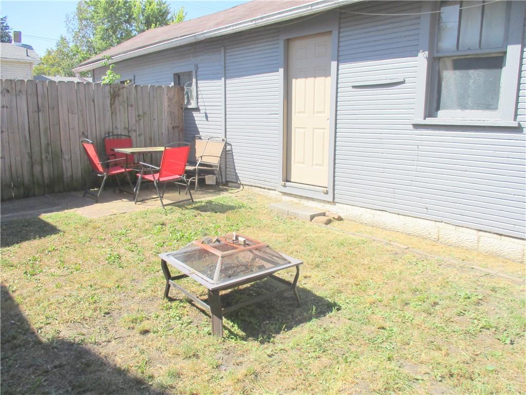 1501 3rd Avenue Beaver Falls, PA 15010 - Photo 2 of 19 a backyard of a house with yard and furniture