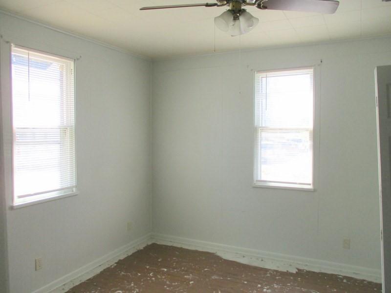 1501 3rd Avenue Beaver Falls, PA 15010 - Photo 5 of 19 an empty room with a window