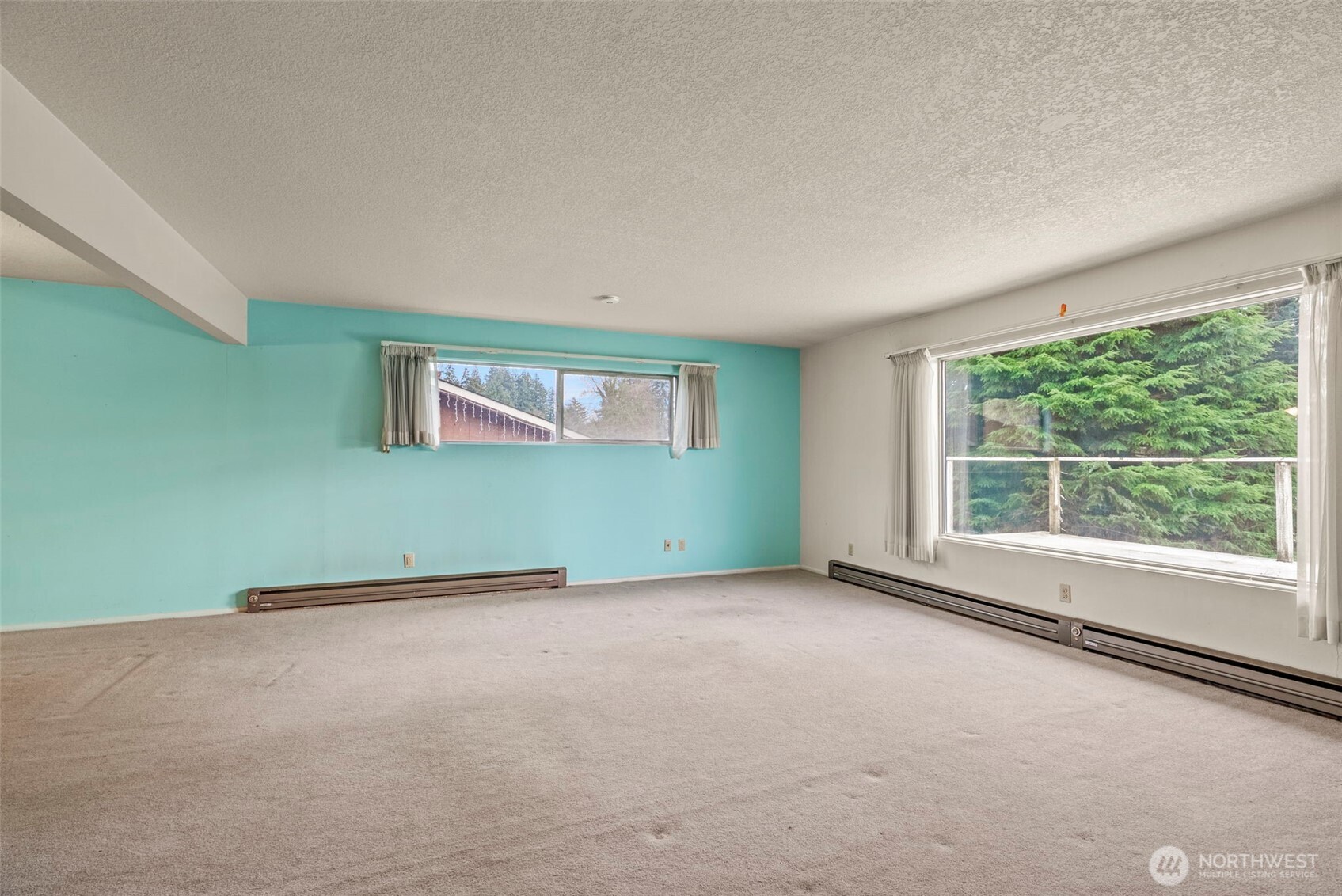 1241 Spruce Street Longview, WA 98632 - Photo 13 of 26 an empty room with a window