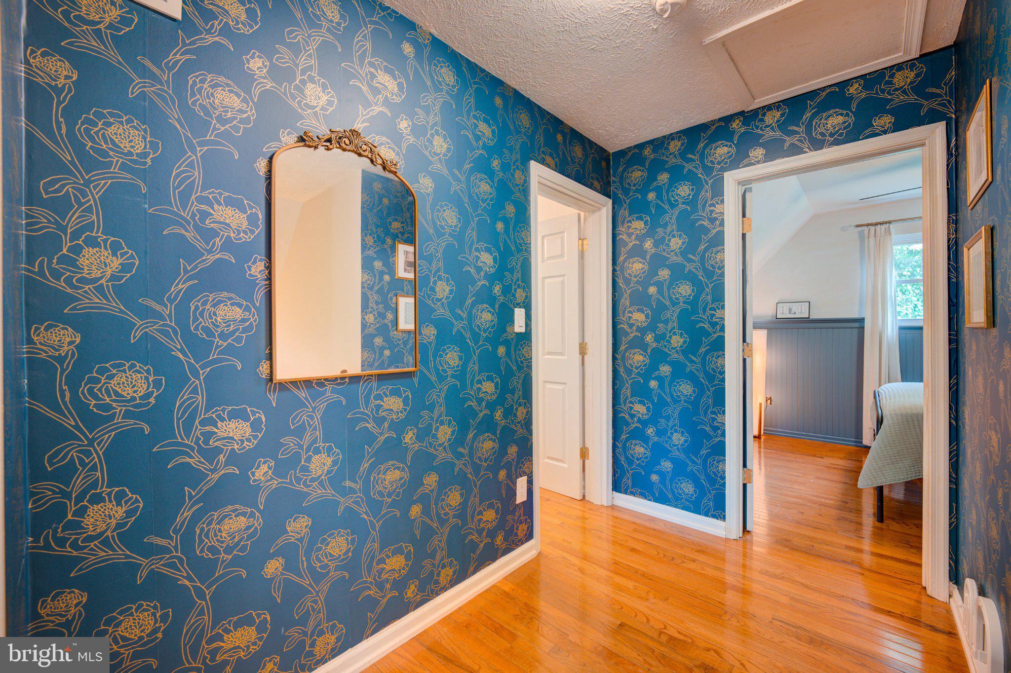 9595 Roys Lane Culpeper, VA 22701 - Photo 24 of 61 Charming hallway with floral elegance.