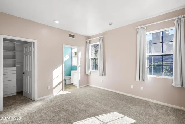 a view of livingroom with furniture and window