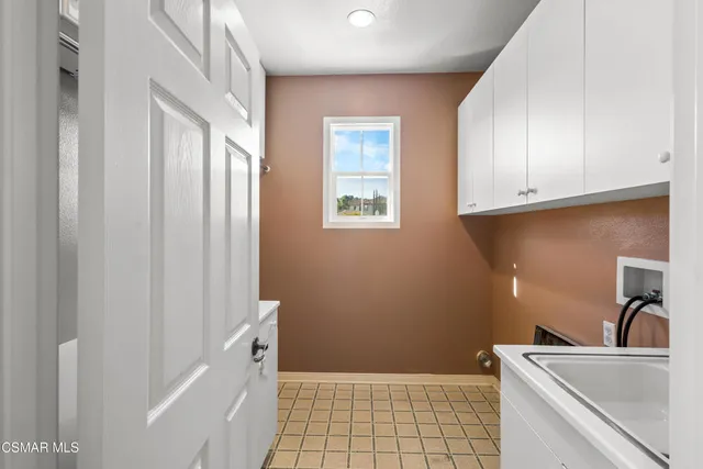 a bathroom with a sink a toilet and tub