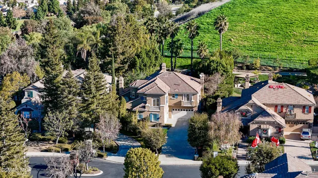 a view of a city with mountains in the background