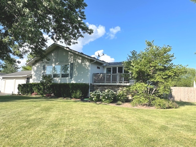 6118 Meyer Road Marengo, IL 60152 - Photo 2 of 42 a view of a house with a yard