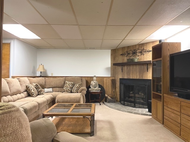 6118 Meyer Road Marengo, IL 60152 - Photo 21 of 42 a living room with furniture a flat screen tv and a fireplace