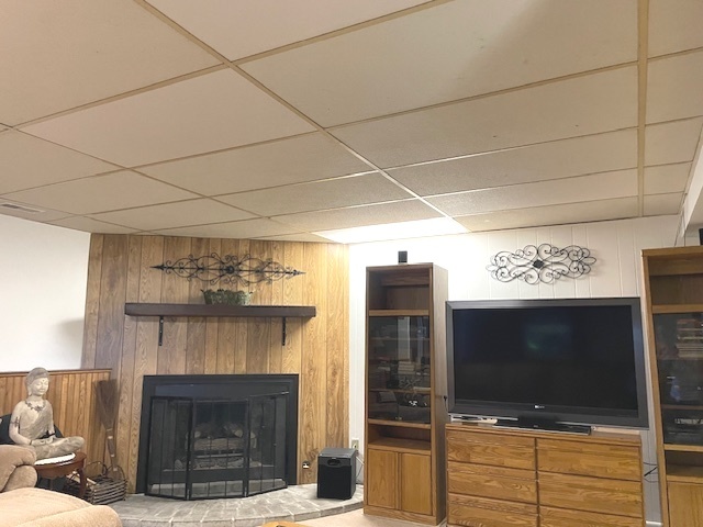 6118 Meyer Road Marengo, IL 60152 - Photo 22 of 42 a living room with fireplace and a fireplace