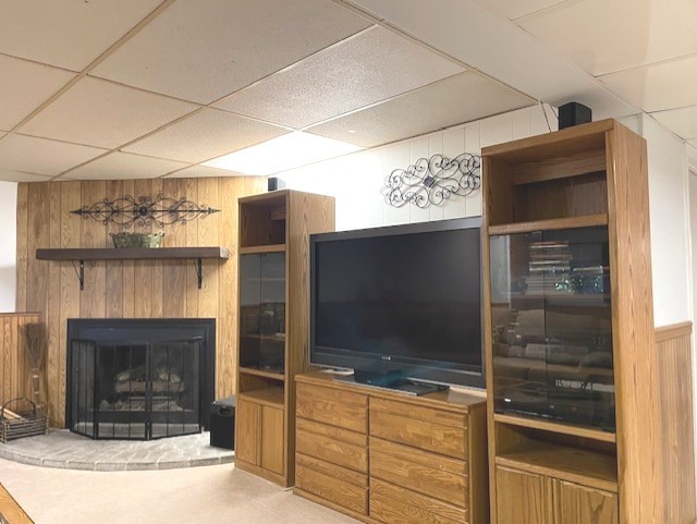 6118 Meyer Road Marengo, IL 60152 - Photo 23 of 42 a living room with flat screen tv and a fireplace