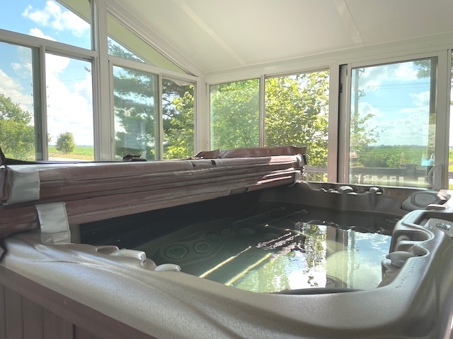6118 Meyer Road Marengo, IL 60152 - Photo 30 of 42 a dining table with wooden floor and a large window