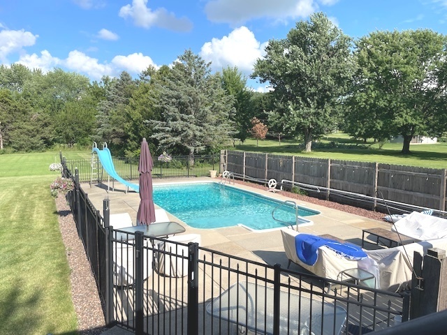 6118 Meyer Road Marengo, IL 60152 - Photo 32 of 42 a view of a house with backyard and sitting area
