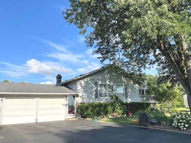 6118 Meyer Road Marengo, IL 60152 - Photo 38 of 42 a front view of a house with a yard