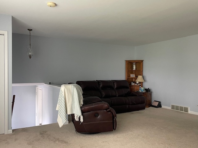 6118 Meyer Road Marengo, IL 60152 - Photo 4 of 42 a living room with furniture and a couch