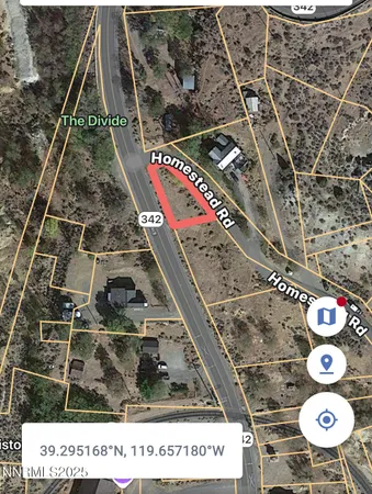 a view of a yard with a mountain