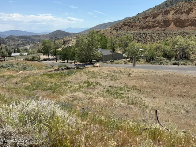 a view of a city with mountain