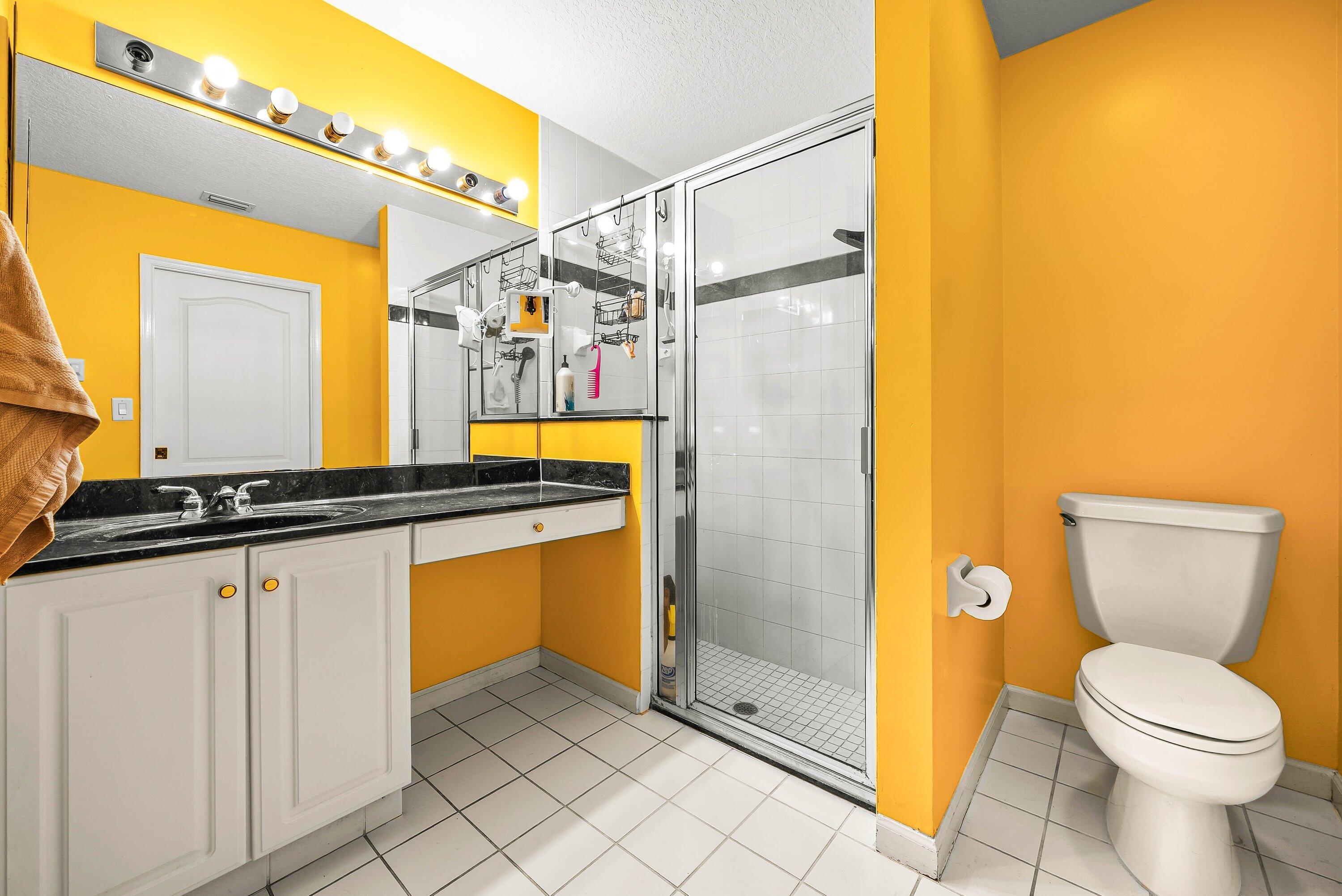 2195 F Road Loxahatchee Groves, FL 33470 - Photo 19 of 54 a bathroom with a granite countertop sink and a mirror