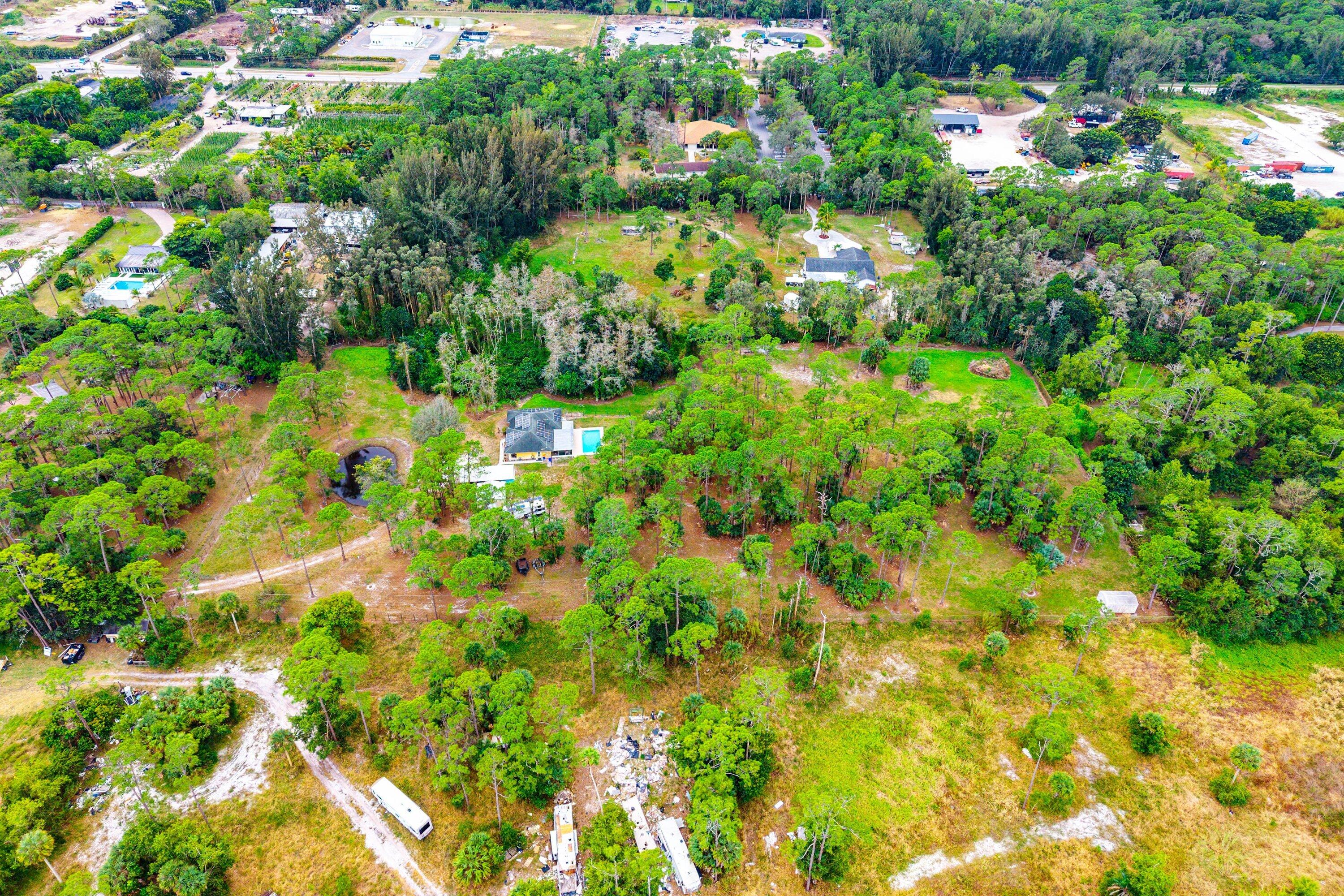 2195 F Road Loxahatchee Groves, FL 33470 - Photo 49 of 54 a view of a garden with plants
