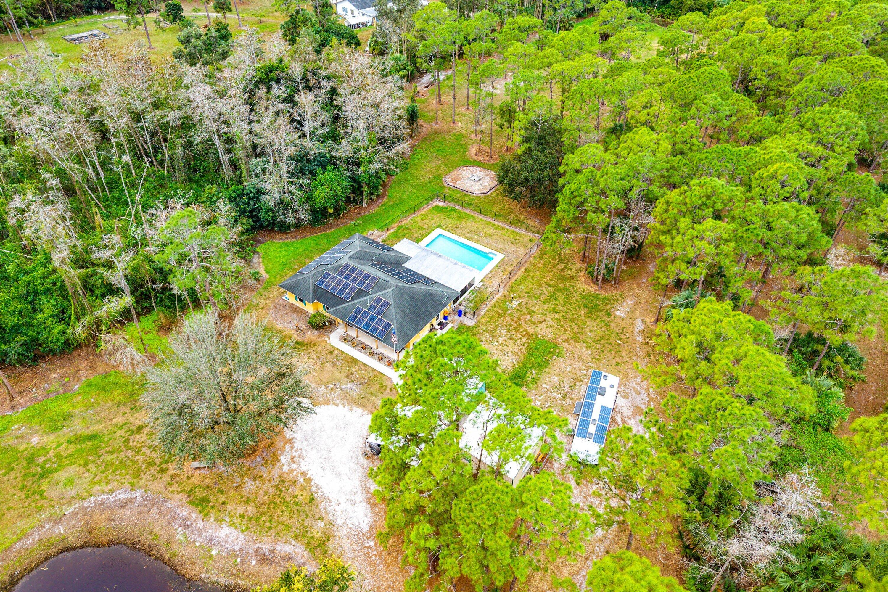 2195 F Road Loxahatchee Groves, FL 33470 - Photo 50 of 54 a view of yard with green space