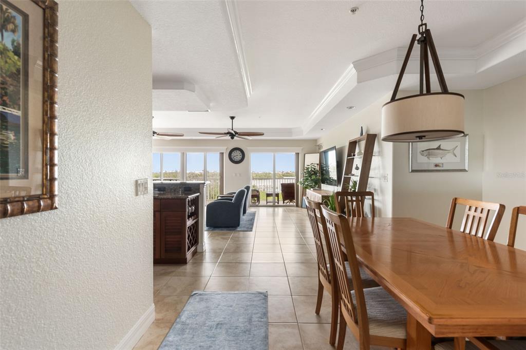 1420 Beach Road, Unit 204 Englewood, FL 34223 - Photo 12 of 99 a view of a dining room with furniture