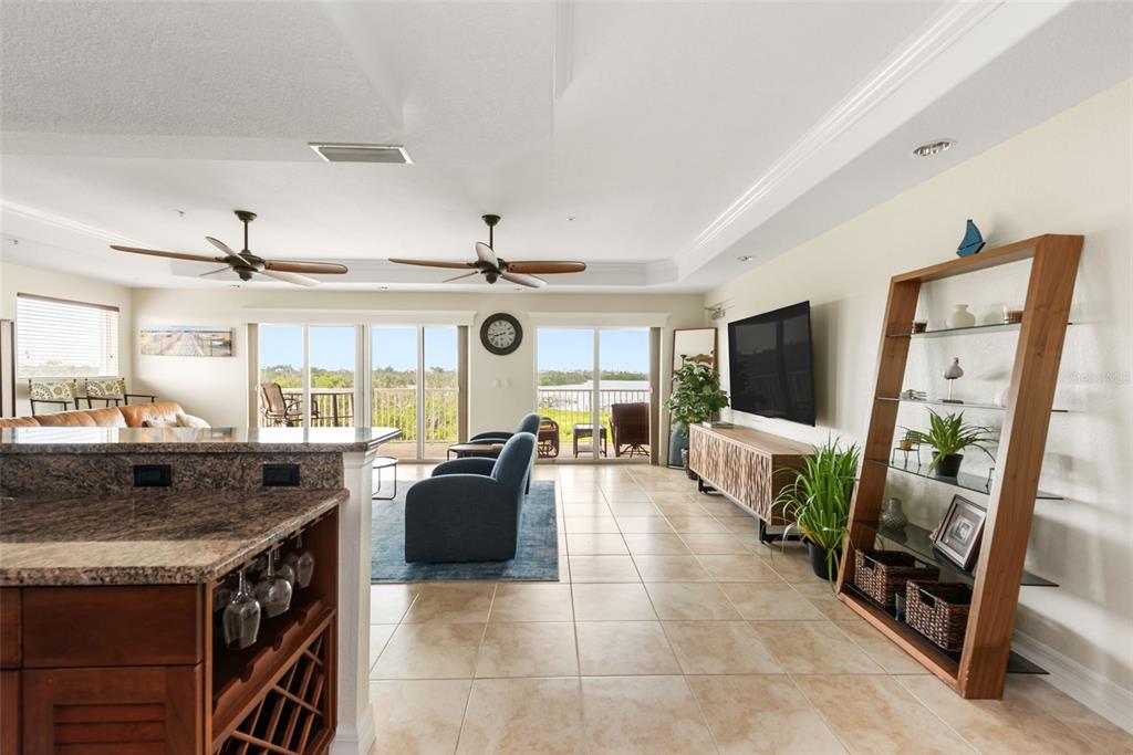 1420 Beach Road, Unit 204 Englewood, FL 34223 - Photo 16 of 99 a kitchen with stainless steel appliances granite countertop a stove and a sink