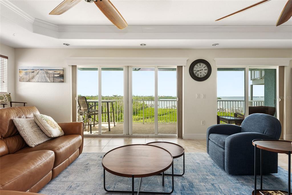 1420 Beach Road, Unit 204 Englewood, FL 34223 - Photo 20 of 99 a living room with furniture and a large window