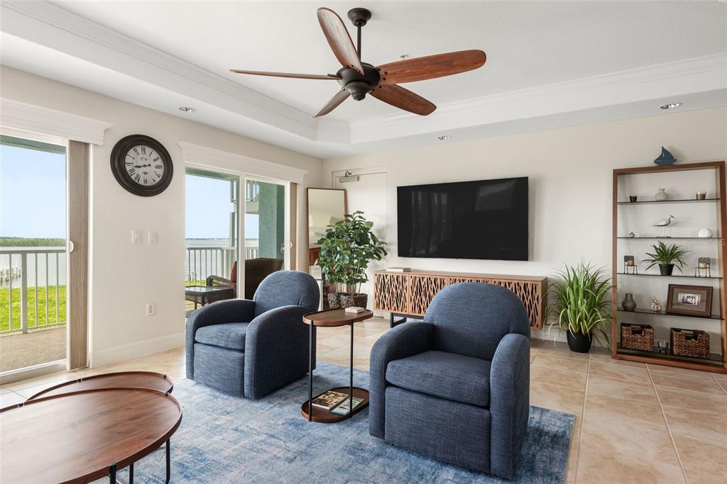 1420 Beach Road, Unit 204 Englewood, FL 34223 - Photo 21 of 99 a living room with furniture and a window