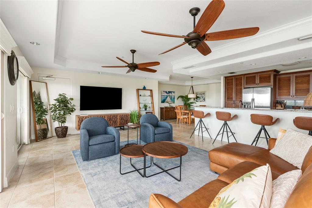 1420 Beach Road, Unit 204 Englewood, FL 34223 - Photo 23 of 99 a living room with furniture kitchen view and a window