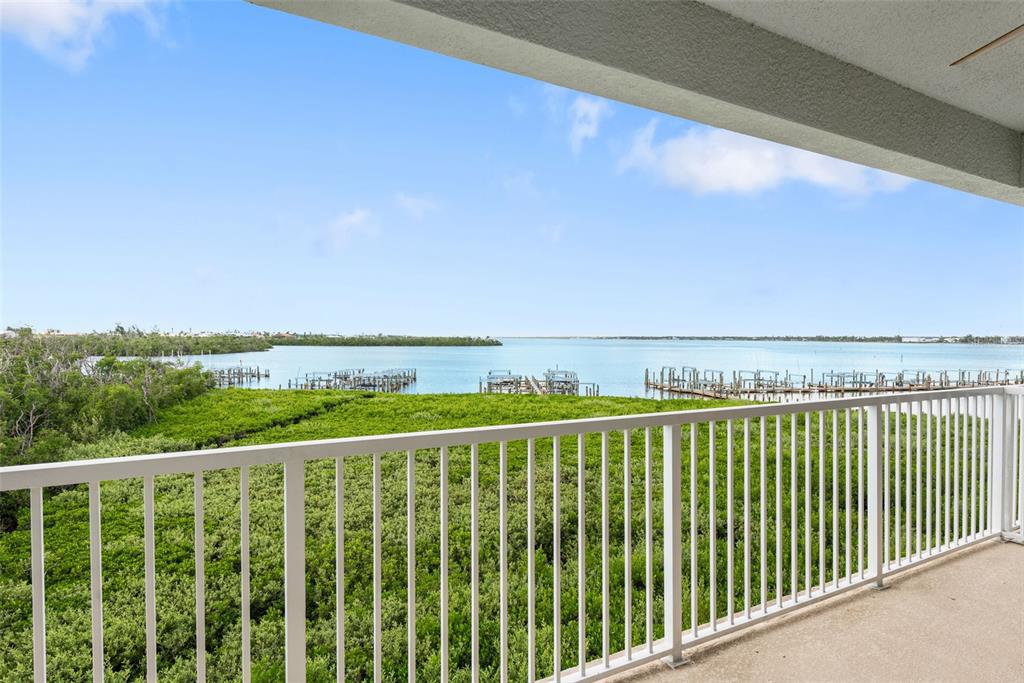 1420 Beach Road, Unit 204 Englewood, FL 34223 - Photo 32 of 99 a view of a balcony with outdoor space