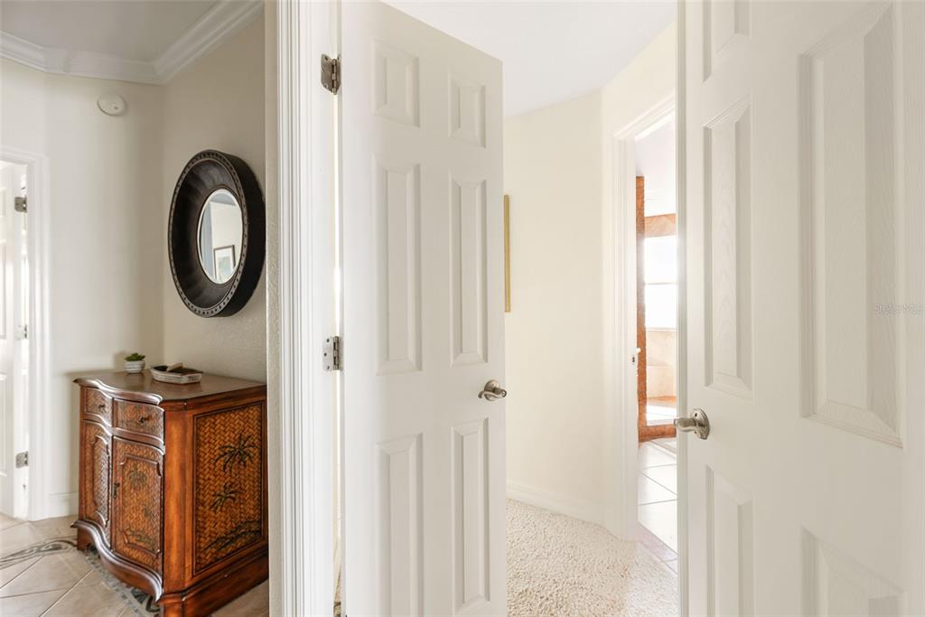 1420 Beach Road, Unit 204 Englewood, FL 34223 - Photo 35 of 99 a view of a bathroom with a sink and a mirror