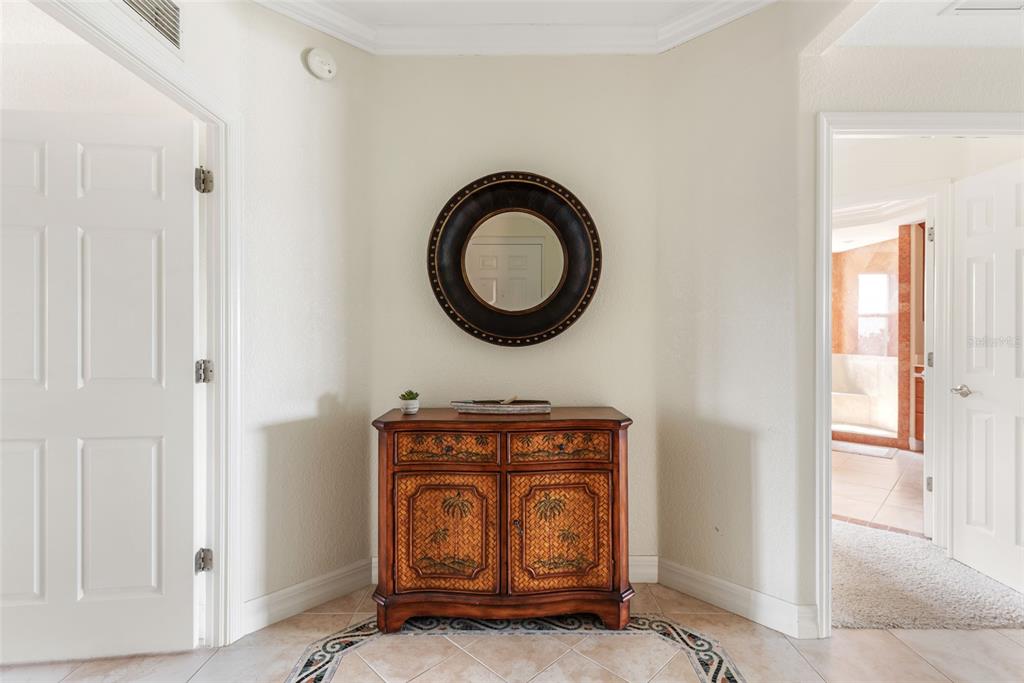 1420 Beach Road, Unit 204 Englewood, FL 34223 - Photo 10 of 99 a bathroom with a sink and a mirror