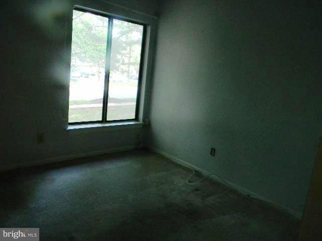 9682 Basket Ring Road Columbia, MD 21045 - Photo 4 of 8 a view of an empty room with a window