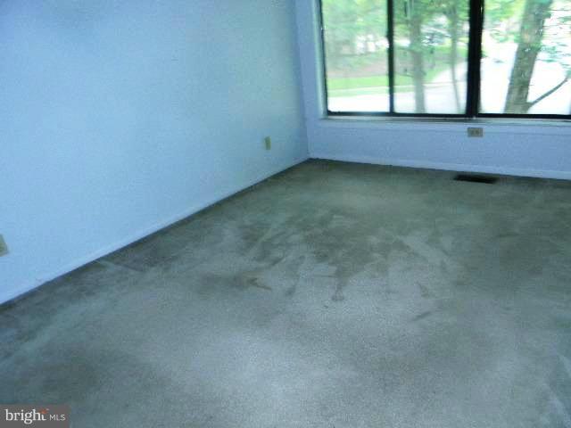 9682 Basket Ring Road Columbia, MD 21045 - Photo 5 of 8 a view of an empty room with a window