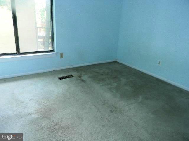 9682 Basket Ring Road Columbia, MD 21045 - Photo 7 of 8 an empty room with a window