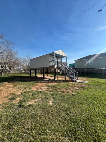 a front view of a house with a ocean view