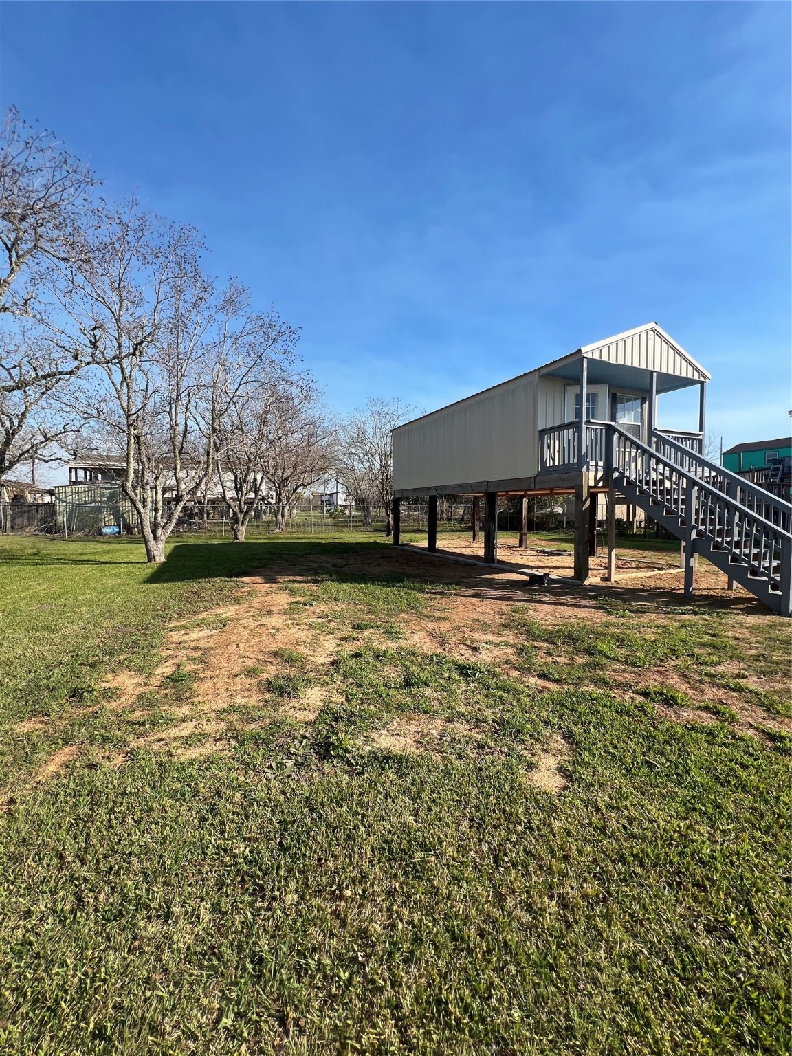 327 17th Street San Leon, TX 77539 - Photo 3 of 23 a view of a house with a yard