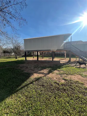 a view of a yard with an outdoor space