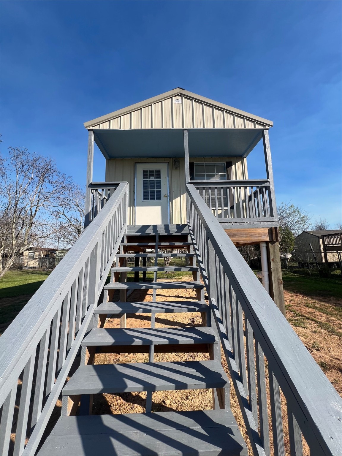 327 17th Street San Leon, TX 77539 - Photo 8 of 23 a view of a house with backyard and deck