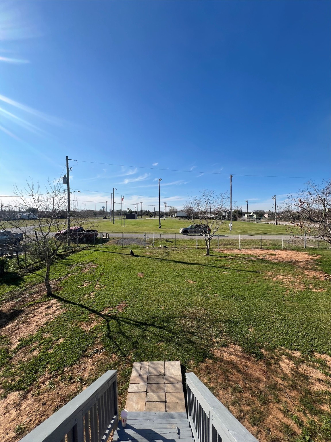 327 17th Street San Leon, TX 77539 - Photo 10 of 23 a view of a field with chairs and a yard